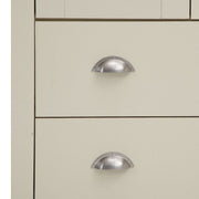 Cream bedroom storage chest with 7 drawers, oak effect top, steel handles, from Lavish Kitchen Isle.