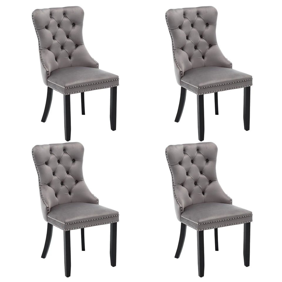 Set of 4 grey and beige velvet wingback dining chairs with button tufted backrests and solid wood legs by Lavish Kitchen Isle.