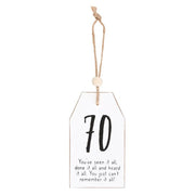 Lavish Kitchen Isle 70 Milestone Birthday hanging sentiment sign for celebration decor, featuring bold lettering and festive design.