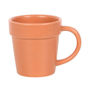 Ceramic plant pot mug with matching shovel spoon from Lavish Kitchen Isle, featuring a plain design and plant-themed details.