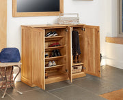 Baumhaus Mobel Oak Extra Large Shoe Cupboard featuring spacious storage and a natural wood finish.