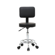 Black round adjustable salon stool with backrest from wearelavishkitchenisland, featuring a sleek design and ergonomic support.