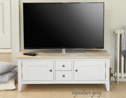 Baumhaus Signature Widescreen Television Stand with sleek design and spacious shelves for media devices.