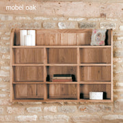 Baumhaus Mobel Oak Reversible Wall Rack with shelves and hooks, showcasing a stylish wooden design on a wall.