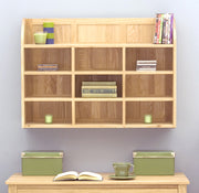 Baumhaus Mobel Oak Reversible Wall Rack featuring a stylish design with multiple shelves for storage and display.