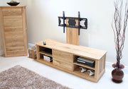 Baumhaus Mobel Oak mounted widescreen television cabinet with a sleek design and natural oak finish.