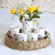 Lavish Kitchen Isle Queen Bee and Bee Keeper mug set featuring bee-themed designs on ceramic mugs for coffee or tea.