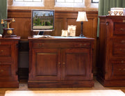 Baumhaus La Roque Hidden Home Office showcasing a stylish desk with concealed storage and modern design elements.
