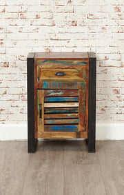 Baumhaus Urban Chic lamp table featuring one door and one drawer, showcasing a stylish wooden design.
