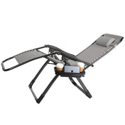Lavish Kitchen Isle grey sun lounger recliner beach chair on patio, adjustable outdoor seating for relaxing in the sun.