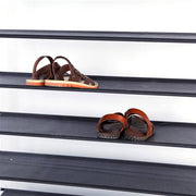 Black 10-tier non-woven fabric shoe rack with handles, simple assembly by Lavish Kitchen Isle, ideal for organized shoe storage.