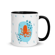 White ceramic octopus mug with colorful inside, 11oz kids mug from Lavish Kitchen Isle, featuring a black octopus design.