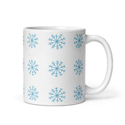 White glossy Christmas mug with snowflake design, 11oz size, handle on the right, perfect for holiday coffee beverages.